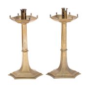 A pair of Victorian brass altar candlesticks,
