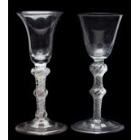 Two wine glasses, the first with bell shaped bowl set on a tapering double knopped,