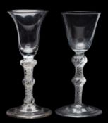 Two wine glasses, the first with bell shaped bowl set on a tapering double knopped,
