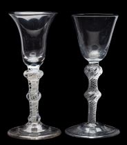 Two wine glasses, the first with bell shaped bowl set on a tapering double knopped,