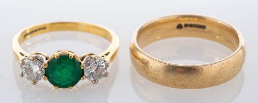 An 18ct gold, emerald and diamond ring,