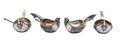 Four Russian enamelled silver Kovsh (salts) and three enamelled matching spoons,