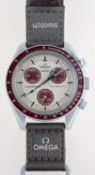 Omega Swatch Speedmaster Mission to Pluto a gentleman's chronograph wristwatch the cream and maroon