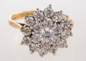 A 9ct synthetic cubic zirconia cluster ring, set with circular cut synthetic cubic zirconia,