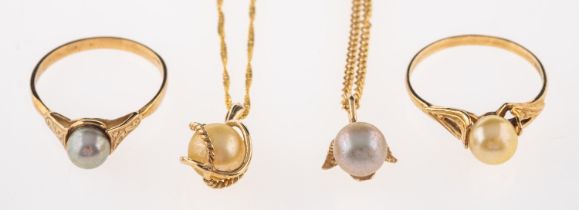 A cultured pearl pendant, on a curb link chain, stamped 375, pendant 1.