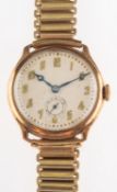 A 9ct gold wristwatch the cream dial with raised gold Arabic numerals and subsidiary seconds dial,