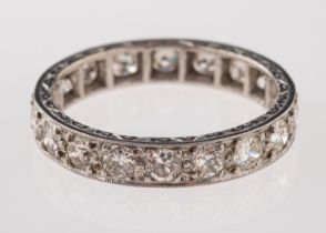 A diamond eternity ring, set with brilliant cut diamonds, approximately 0.