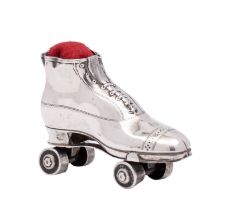 An Edward VII silver novelty pin cushion in the shape of a roller skate,