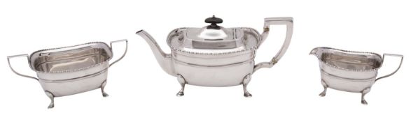 A George V silver three piece tea set, Fenton Brothers Ltd, Sheffield 1917,