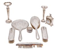 An early 20th Century silver dressing table timepiece, Chester, other marks rubbed out,