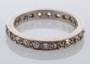 A diamond eternity ring, set with old cut diamonds,