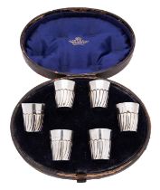 A cased set of six Victorian silver whisky tots, Jesse Earls London 1889,