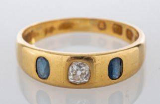 An 18ct gold, sapphire and diamond ring, the central old cut diamond,