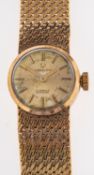 Verity, a lady's gold wristwatch the round dial with raised baton numerals and signed Verity,