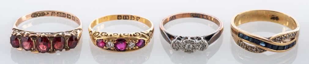 Four gem set rings, to include: a ruby and diamond ring, stamped 18,