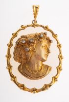 A 1970s 9ct gold and diamond cameo pendant, the oval pendant with an applied female profile,