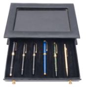 A Pierre Faber fountain pen and roller ball pen set, black with gilt fittings,