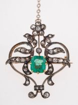 An emerald and diamond openwork brooch,