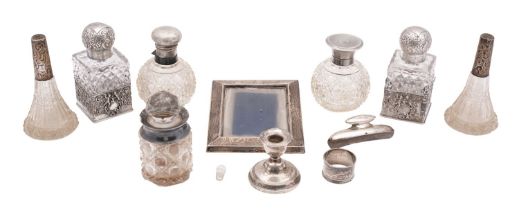 A pair of George V silver and glass dressing Ttable bottles, James Dixon & Sons Ltd, Sheffield 1910,
