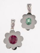 A platinum garnet pendant, designed as a flowerhead,