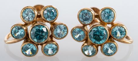 A pair of 9ct gold blue zircon cluster earrings;