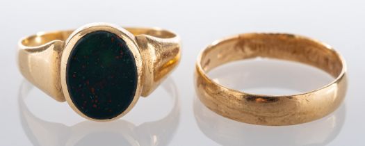 Two 9ct gold rings, including a bloodstone signet ring; and a band ring, ring, ring sizes P-R,
