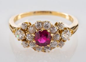 A cushion-cut ruby and old-cut diamond cluster ring, estimated ruby weight ca. 0.