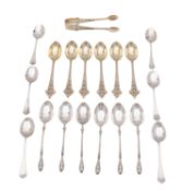 A cased set of George V silver gilt teaspoons and sugar tongs,