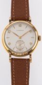 Longines a gentleman's gold wristwatch the champagne dial with Arabic and Baton numerals,