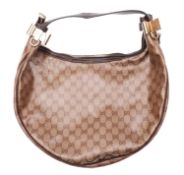 Gucci, A brown leather and monogrammed canvas shoulder bag, gold tone hardware,