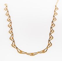 A 9ct gold necklace, of fancy openwork swag design, on a plain back chain, weight 11.3gms approx.