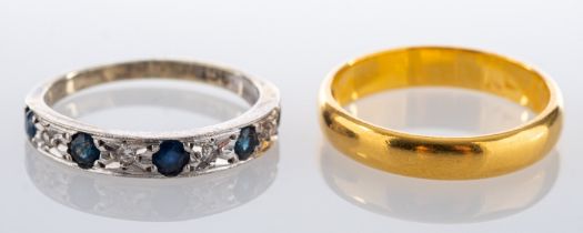 Two rings, including a 22ct gold band ring, ring size M, total weight ca. 3.