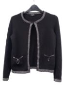 Chanel. A vintage black and grey wool cardigan,.