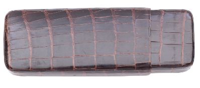 Ducas, Paris. A faux crocodile skin cigar case: approximately 14cm long when closed.