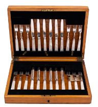 An oak cased set of silver plated and mother of pearl fruit knives and forks, maker Charles James,