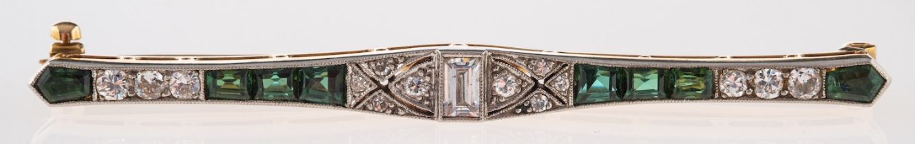 A diamond and tourmaline bar brooch,