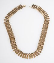 A 9ct gold fringe necklace, the articulated necklace with rectangular shaped drops, stamped 375, 38.
