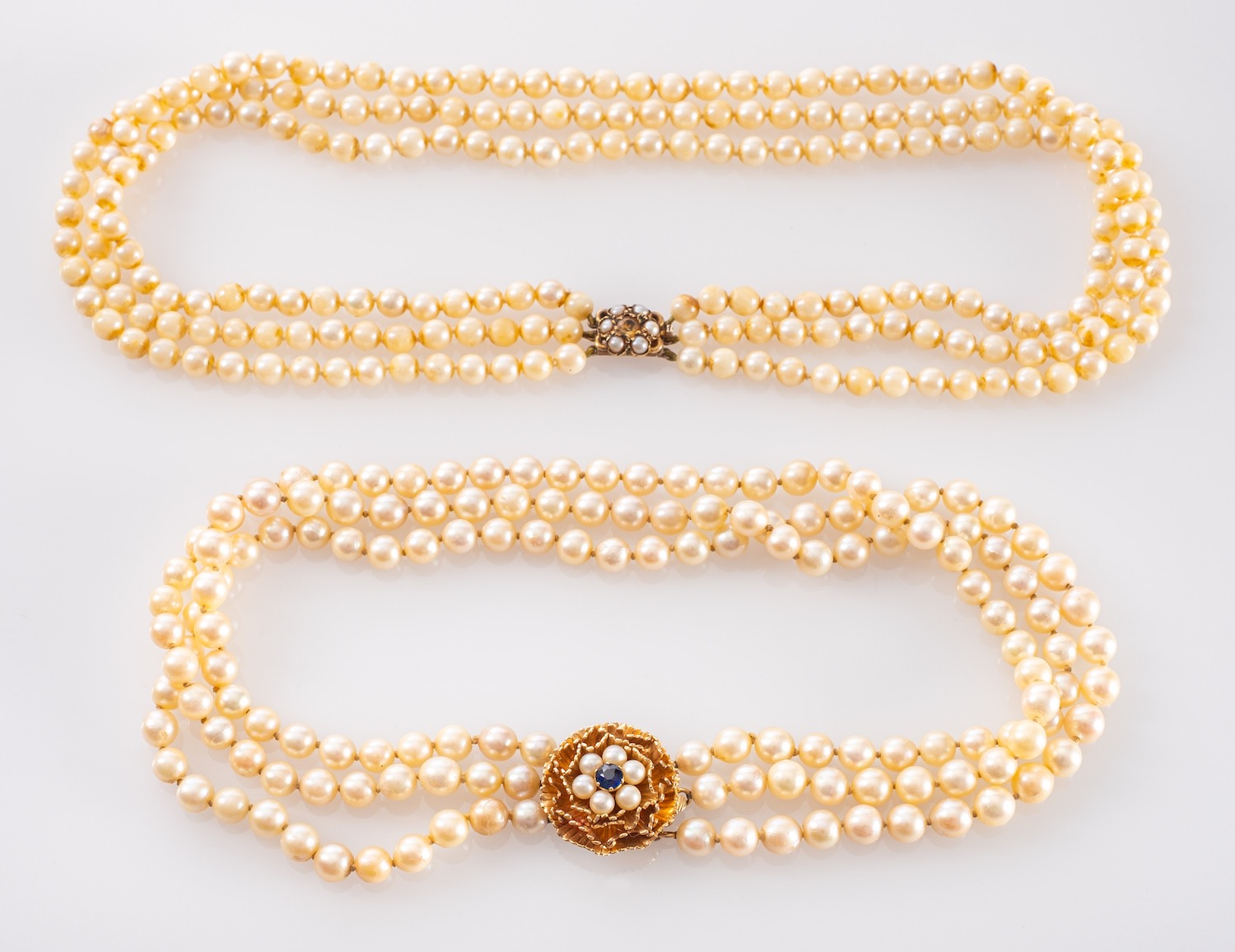 Two triple-row, cultured pearl necklaces, including a choker necklace,