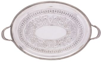 A large Edwardian silver-plated tray, maker Henry Wilkinson & Co, Sheffield, of oval form,