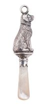 A George V silver and mother of pearl child's rattle teething stick, maker W H Carrington & Co,
