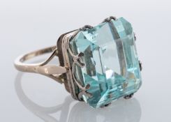 A single stone aquamarine ring,