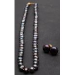 A single-row, cultured 'Tahitian' pearl necklace and pair of cultured, 'Tahitian', button,