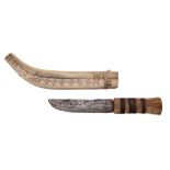 An early 20th century Inuit reindeer bone and steel knife,