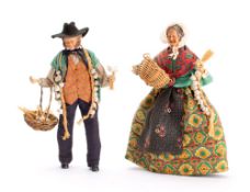 A pair of early 20th century Swiss onion or garlic seller dolls,