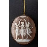 A shell cameo brooch, depicting The Three Graces, stamped '9CT', total length ca.