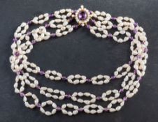 A multi-strand, cultured, fresh-water pearl choker necklace,