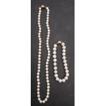 A cultured pearl necklace and bracelet, diameter of cultured pearls on necklace ca. 7-7.