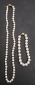 A cultured pearl necklace and bracelet, diameter of cultured pearls on necklace ca. 7-7.