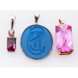 A Platinum Rubellite Pendant, claw set with a rectangular garnet and a rubellite tourmaline,