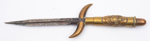 A WWI trench art German Ariel Flechette dagger, the steel flechette blade over reverse .